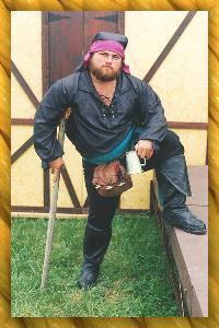 Photo of Sean K. Miller as Red Dougless, Captain, The Dancing Lassie